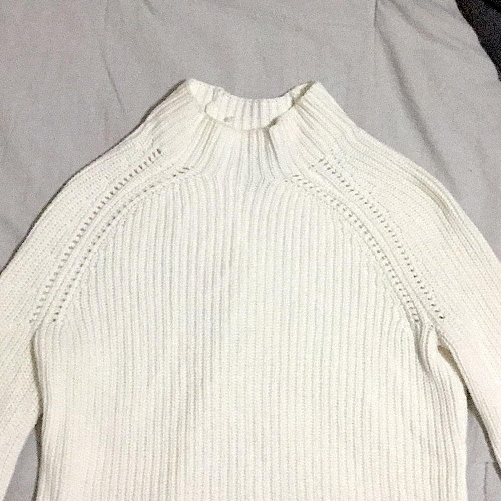 white sweater